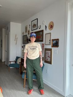 "90s military fatigue green pants  no tag size  Rise: 12\" Flat across: 19\" Inseam: 28\"  Thigh flat: 14\" hips: 23\" Boho, retro, 60s, 70s, 80s, and 90s vibes  Vintage items may have imperfections, if they are major or extremely visible they will be noted Smoke free home  No shedding pets Cleaned before mailing + urban outfitters  + free people + madewell  + vintage  Vintage items may/will probably have imperfections, if they are major or extremely visible they will be noted. Buying vintage items could mean they are different than what you had expected, but still just as lovely because they have lived a full life and have a story to tell!  We know that paying for shipping isn't ideal, but we are a small company and vintage items can be quiet heavy since they are made out of better materi Green Short Sleeve Turtleneck Outfit, Retro Cotton Cargo Pants For Fall, Vintage Cargo Pants For Spring Streetwear, Vintage Relaxed Fit Cargo Pants For Spring, Green Cotton Cargo Work Pants, Vintage Khaki Bottoms For Fall, Spring Vintage Straight Leg Cargo Pants, Green Wide Leg Work Pants For Streetwear, Wide Leg Green Work Pants For Streetwear