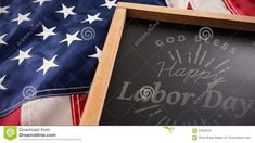 an american flag and a chalkboard with the words happy labor day written on it