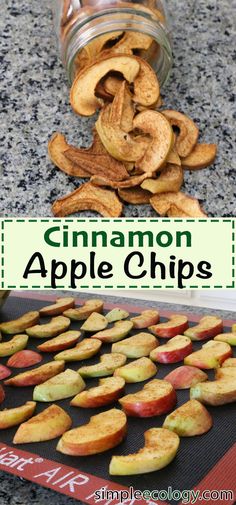 cinnamon apple chips on a baking sheet and in a glass jar next to them are sliced apples