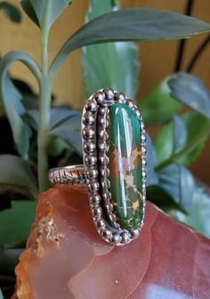 Natural Royston Turquoise.  Hand crafted sterling silver setting with textured band. Size 7 Untreated Chrysocolla Turquoise Ring In Silver, Royston Turquoise, Turquoise Sterling Silver, Rings Statement, Sterling Silver Ring, Statement Rings, Silver Ring, Sterling Silver Rings, Jewelry Accessories