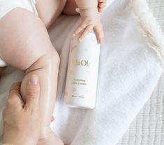 Nurture your little one's baby-soft skin with our extra gentle, non-greasy baby lotion. Developed with pediatric dermatologists, this formula is made with our signature plant-based blend of marine algae, coconut water, jojoba oil and squalane. This lightweight, silky formula not only moisturizes but also helps restore skin's natural barrier to keep irritants out and dryness away. Provide 96 hours of hydration and moisture barrier nourishment. Photoshoot Angles, Black Branding, Body Hydrating Cream, Marine Algae, Gentle Baby, Baby Soft Skin, Baby Lotion, Flaky Skin, Baby Skin Care