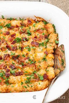 a casserole dish with bacon, cheese and parsley