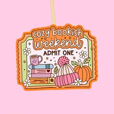 a sticker with the words cozy bookish weekend and an image of books on it