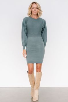 Chic and cozy, this sweater dress is perfect for dressing up or down Winter green color Soft sweater material Round neckline Long drop shoulder bubble sleeves with fitted cuffs Ribbed waistline that stretches slightly Ribbed at neckline, sleeve cuffs, and hem 50% Viscose, 28% Polyester, 22% Nylon Trina is 5'6, cup size 32D, size 2 and is wearing size S Cocktail Jumpsuit, Destination Dress, Sweater Material, Romper Outfit, Velvet Fashion, Softest Sweater, Winter Dresses, Holiday Fashion, Fall Dresses