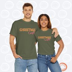 🎄 Christmas Couple Personalized Couples Tees - Gingerbread Cookie Letters 🍪 Cozy up this holiday season with our custom "Christmas Couple" couples tshirt! The word "Christmas" is made of gingerbread cookie letters, adding a sweet and festive touch to your look. To make it even more special, your names are printed on the back in matching gingerbread-style lettering, making this the perfect shirt for celebrating in comfort and style. ✨ Product Details: - Solid colors are 100% cotton; Heather col Christmas Cotton T-shirt For Loungewear, Cookie Letters, Orange Christmas, Couple Tees, Gingerbread Cookie, Couple Tshirts, Christmas Couple, Adulting Shirts, Matching Family Outfits