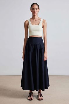 Indulge in the timeless elegance of the Nora Asymmetric Maxi skirt. Crafted from luxurious 100% organic cotton, this classic black skirt exudes class. The gathered detail at the hip adds a touch of artful flair and flatters your figure. Perfect for any special occasion or upscale event, this maxi skirt is a must-have for the fashion-forward woman. Cotton Maxi Skirt, Cotton Maxi Skirts, Black Maxi Skirt, Long Skirts For Women, Mother Denim, Hair Fragrance, Knit Sweatshirt, Frame Denim, Ulla Johnson