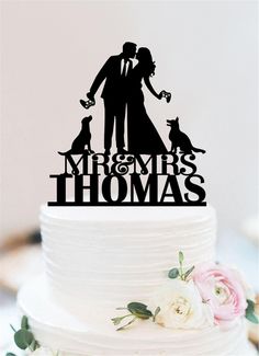 a wedding cake topper that says mr and mrs