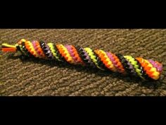 multicolored bracelets are lined up on the floor