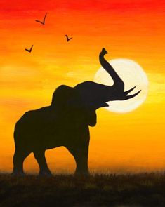 an elephant standing in front of a sunset with birds flying above it and the sun setting