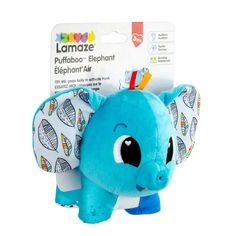 an elephant stuffed animal toy is in front of a white background with the tag on it's ear