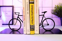 two bookends made to look like bicycles