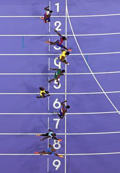 the athletes are competing on the starting line at the olympic games in london, england