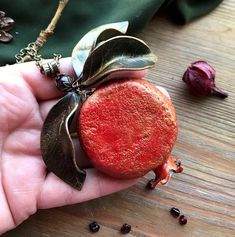 "This necklace already sold but I can make very similar (not 100% same) for your order. If you need longer chain please write it in comment to order) Statement juicy pomegranate pendant with leaves. Pomegranate seeds - natural garnet. skin and leaves - polymer clay. the bead at the top of the pendant is garnet. Garnet pomegranate ) Garnet - January birthstone Diameter of pomegranate 5cm (1.96\") Chain 48cm (19\")" Nature-inspired Gemstone Necklace For Gifts, Nature-inspired Gemstone Necklace For Gift, Artisan Red Necklace For Gift, Red Natural Stones Nature-inspired Jewelry, Red Nature-inspired Jewelry For Gifts, Handmade Red Nature-inspired Necklace, Handmade Garnet Pendant Necklace, Garnet Pendant Necklace For Gifting, Garnet Pendant Necklace Gift