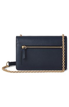 A gleaming turnlock closure and chain strap put the polish on a sleek compact clutch fashioned from Italian leather and featuring a perfectly organized interior. Top flap with turnlock closure Optional chain strap Interior zip and slip pockets; eight card slots Leather lining Calfskin leather Imported Designer Handbags Classic Evening Crossbody Wallet, Classic Evening Wallets With Detachable Strap, Classic Wallet On Chain With Removable Pouch For Formal, Formal Clutch Wallet With Chain Strap, Classic Formal Wallet With Chain Strap, Classic Crossbody Wallet On Chain With Gold-tone Hardware, Classic Crossbody Wallet With Chain Strap, Elegant Wallet On Chain With Gold-tone Hardware For Travel, Classic Wallet On Chain With Chain Strap For Office