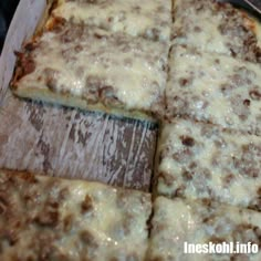 the pizza is cut into eight pieces and ready to be served in the oven or on the table