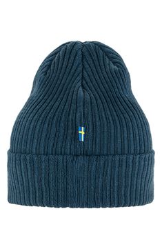 Knit with chunky ribbing, this beanie made entirely of recycled fibers wicks away sweat as it keeps you warm for performance comfort when the temperatures drop. Moisture-wicking fabric engineered for dryness and comfort 100% recycled polyester Machine wash, dry flat Imported Outdoor Blue Knitted Beanie, Indigo Blue, Wicks, Moisture Wicking Fabric, Moisture Wicking, Nordstrom, Knitting, Fabric, Blue