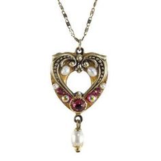 Lightweight garnet heart necklace, handmade with bright and glowing freshwater pearls. This classic piece is sure to be a wardrobe staple that will add elegance to any look. Item Details: -Materials: Garnet, freshwater pearls -Metal: 24K gold electroplated over brass -Size: Chain adjustable 15-20″, pendant 1″ -Handmade in our NYC studio -Complimentary gift wrapping -Item Number: N1951 Repairs Policy: Repairs are free. Customers will only be asked to pay $5 for shipping. Expect processing time fo