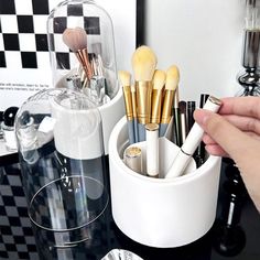 Description: Organize your makeup brushes in style with our makeup brush storage tube. Crafted from high-quality PP material, this holder offers a smooth surface and sturdy structure for a premium user experience. The removable middle compartment allows for easy cleaning and maintenance. Featuring a rotating base with anti-slip rubber pads, this container ensures stability and smooth rotation without scratching your countertop. With 7 removable compartments, you can store various makeup brushes Stylish Makeup, Brush Storage, Makeup Brush Storage, Makeup Brush Holder, Cosmetic Display, Make Up Brushes, Vanity Decor, Makeup Brush Holders, Cosmetic Storage