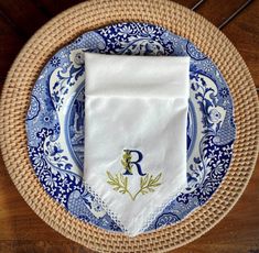 a blue and white plate with a napkin on it