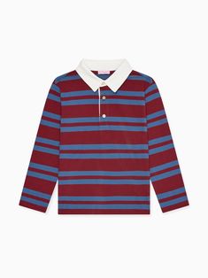 The Tijo Long Sleeve Boy Rugby Shirt has steadily become a staple in La Coqueta's collections, cut from responsibly sourced soft cotton jersey with a blue garment wash for a lived-in feel. Our idiosyncratic take on the classic rugby shirt has a vintage touch to it, complete with an appliquéd felt crest and the embroidered LC logo in contrasting thread for a collegiate, preppy look. It has long sleeves and dropped shoulders, with wide colour block stripes in light blue and burgundy red, a contrasting white collar, and a three-button fastening for a stylish and comfortable finish. Get the La Coqueta look this season and discover the wider range of boy’s clothing and shoes to elevate your little one’s everyday wear with versatile styles, and pair with La Coqueta's stretch cotton socks and tig Lc Logo, Boys School Shoes, Blue And Burgundy, Red A, Preppy Look, Cardigan Shirt, Boys Boots, Socks And Tights, Rugby Shirt