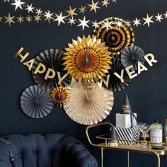 a happy new year party with decorations on the wall