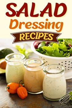 salad dressing recipe in mason jars on a table with vegetables and sauces around it