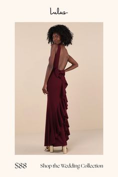 the back of a woman's dress in burgundy