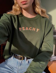 Handmade embroidered Peachy text onto unisex sweatshirt ✯PRODUCT DETAILS✯ Please note: The photos taken are only indicative every single top is completely handmade therefore all unique! ✯ECO SWEATSHIRT✯  Currently only available in Size Small, Medium and Large  The eco sustainable sweatshirt is made to a very high quality, it's crafted from premium organic and recycled fabrics.  It's 350gsm (so nice and thick) and the inside is a super soft brushed fabric, so will keep you nice and warm! Materia Peach Sweater, Sweater Embroidery, Baggy Tee, Retro Sweatshirts, Embroidered Clothes, Oversized Style, Hoodie Material, Great T Shirts, Embroidered Tshirt