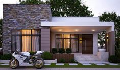 a motorcycle is parked in front of a modern style house at dusk with the lights on