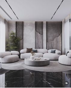 a modern living room with marble floors and walls