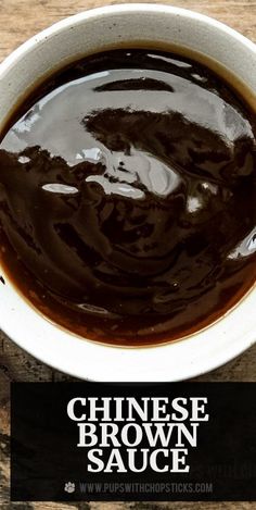 a bowl of brown sauce sitting on top of a wooden table with the words chinese brown sauce