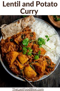 lentil and potato curry in a white bowl with rice on the side text overlay reads lentil and potato curry