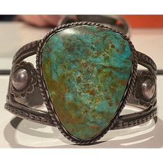 I bought this from legendary antiques dealer, Marcy Burns. It has been a well loved piece even years before I was its custodian. This piece will go to a very special person. Vintage Patina Cuff Bracelet, Vintage Turquoise Bangle Cuff Bracelet, Antique Turquoise Bangle, Antique Turquoise Bangle Cuff Bracelet, Vintage Turquoise Engraved Bracelets, Vintage Turquoise Bangle As A Gift, Handmade Turquoise Vintage Cuff Bracelet, Antique Turquoise Cuff Bracelet Gift, Antique Turquoise Cuff Bracelet As Gift