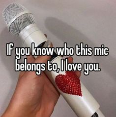 someone holding a microphone with the words if you know who this mic belongs to, i love you