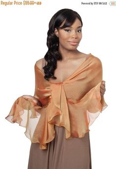 Bold and Bright colors for this season. With this Silk Fluttering Wrap in sophisticated orange that, much like Amber, a warm, honeyed yellow, you can imagine a faraway lands and locales. To buy a set of scarf and flower clip click on this link: Elegant Gold Scarves For Spring, Elegant Orange Summer Scarf, Elegant Brown Scarf For Spring, Gold Shawl For Fall, Chic Brown Scarves For Spring, Wedding Shawls, Evening Wraps, Silk Chiffon Scarves, Wedding Shawl