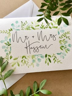 there is a card with the words, we are mrs hudson and green leaves on it