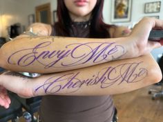 two people with tattoos on their arms that say, enjoy me and cherish me