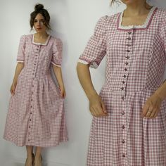 Dirndl Dress / Trachten Dress / Plaid Cotton folk  dress / Austrian German dress / Octoberfest Oktoberfest dress  / Country dress Brand:  OS Trachten Size: 38-40 Measurements, flat: Overall length: 120 cm (47.24'') From armpit to armpit: 47 cm  (18.50'') Waist: 43 cm x2 (16.92'' x2) Material: cotton. Model in the photos is size 8UK/4US; 164 cm/5'5''. Condition: very good vintage condition. PLEASE read description. For better fitting I would suggest you compare measurements to a garment that you Cottagecore Plaid Dress With Short Sleeves, Traditional Summer Dresses With Buttons, Traditional Fitted Dresses For Oktoberfest, Vintage Short Sleeve Festival Dresses, Country Dress, Oktoberfest Dress, German Dress, Folk Dress, Dirndl Dress