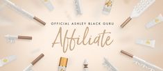 the official ashey back guru logo is surrounded by white and gold lipstick tubes, which spell out their name