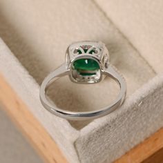 Emerald engagement ring sterling silver cushion cut emerald | Etsy Elegant Sterling Silver Emerald Ring With Halo Design, Radiant Cut Emerald Ring In Sterling Silver For Wedding, Asscher Cut Emerald Ring With Halo Setting For Promise, Silver Radiant Cut Emerald Ring With Halo Setting, Radiant Cut Emerald Ring With Halo Setting For Promise, Cushion Cut Emerald Ring For Formal Occasions, Elegant Asscher Cut Emerald Ring With Halo Setting, Green Sterling Silver Halo Ring, Sterling Silver Green Halo Ring