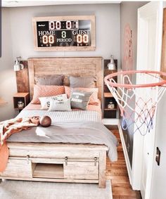 a bedroom with a basketball hoop in the corner