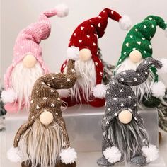 christmas doll ornaments in different colors and sizes