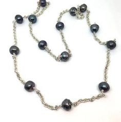 A touch of luxury.  Slip this substantial necklace over your head and head out the door. Arizona Jewelry, Sky Jewelry, Classic Sheath Dress, Peacock Pearl, Jewelry Artist, Ribbon Wrap, Station Necklace, Artistic Jewelry, Black Pearl