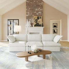 a living room filled with furniture and a fire place in the middle of an open floor plan