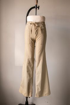 Vintage Beige Wide Leg Bottoms, Retro Bottoms With Button Closure, Vintage Wide Leg Beige Bottoms, Vintage Full Length Bottoms With Button Closure, Beige Cotton Flare Bottoms, Beige Flare Cotton Bottoms, 1970s High Waist Cotton Bottoms, Vintage Brown Bottoms With Buttons, 1970s Style Full-length Cotton Bottoms