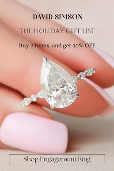 a woman's hand holding an engagement ring with the words, holiday gift list buy 2 items and get 30 % off shop engagement ring