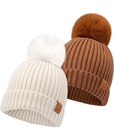 two knit hats with pom - poms on them, one brown and one white