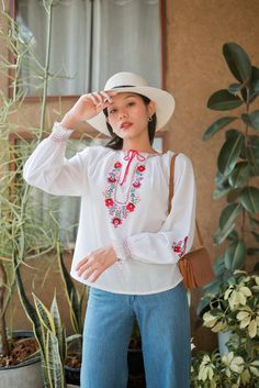 "Gorgeous vintage Hungarian floral embroidered blouse. The blouse features long sleeves with embroidered flowers. Made from soft cotton. Condition: In great vintage condition. Made in Switzerland Details and Measurements (Inch) size estimate: m *Measurements are taken in inches with the garment laying flat. BUST: 42 \" FULL LENGTH: 23 \" SLEEVE LENGTH: 26 \" from neck 18\" form armpits *If you are not sure about size please feel free to contact me I would be happy to help all questions and reque Cottagecore Long Sleeve Blouse With Floral Embroidery, Folk Style Long Sleeve Top With Embroidered Cuffs, Long Sleeve Embroidered Top With Floral Design For Summer, Bohemian Cotton Blouse With Embroidered Cuffs, Spring Folk Embroidered Peasant Top, Folk Style Long Sleeve Embroidered Top For Summer, Spring Long Sleeve Embroidered Top, Folk Style Embroidered Long Sleeve Top For Summer, Spring Long Sleeve Top With Embroidered Cuffs