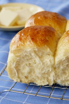 two pieces of bread sitting on top of a cooling rack