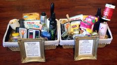 two baskets filled with personal care items on top of a wooden table next to pictures